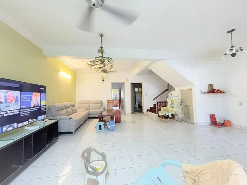 Living features: white tiled flooring, green accent wall, sofa set in light grey, wall-mounted TV, ceiling fan, recessed lighting, staircase in background, decorative ceiling light, coffee table, plastic chairs, children's chair, open layout; style: modern.