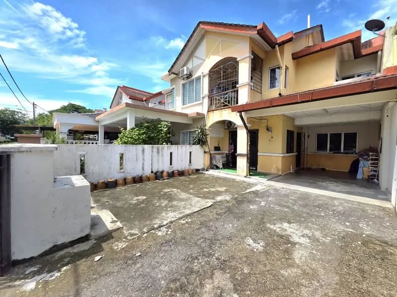 Exterior type: semi-detached house; features: two-storey structure, cream painted facade, red tiled roof, open car porch, concrete driveway, manicured garden area, potted plants along the wall, balcony on the upper floor, exterior wall with windows, visible air conditioning units; style: modern.