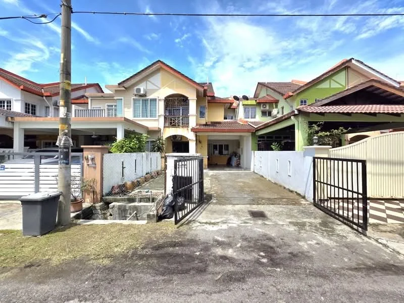 Exterior type: linked terrace house; features: two-storey building, red tiled roof, cream painted facade, green accent wall, front porch, fenced yard, manicured lawn, driveway, visible air conditioning units, gated entrance, sidewalk, street view; style: modern.