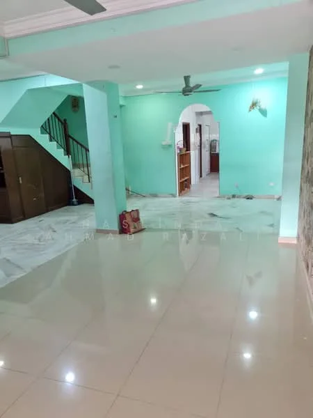 Living features: light-colored marble flooring, green painted walls, ceiling fan, recessed downlights, open layout, staircase with black railing, wall with decorative wallpaper, natural light from windows; style: modern. Room features: white walls, tile flooring, archway leading to another room, built-in shelving unit.