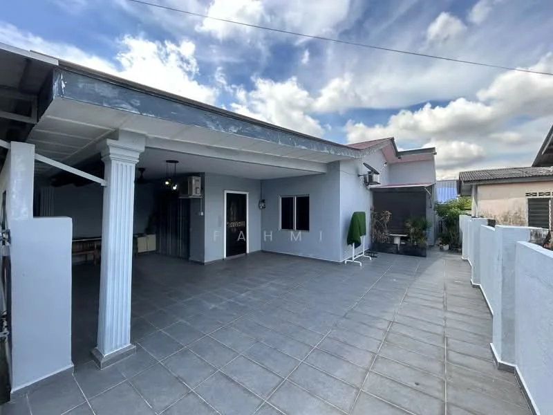 Exterior type: linked terrace house; features: grey painted facade, flat roof, covered porch area, tiled flooring, white columns, manicured garden area, fenced perimeter, outdoor lighting, open space for outdoor seating; style: modern.