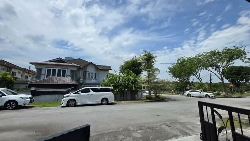Exterior type: detached bungalow; features: two-storey building, grey painted facade, gabled roof, front porch, manicured lawn, surrounded by trees, driveway with parked cars, street view, sidewalk, open sky, residential neighborhood; style: modern.