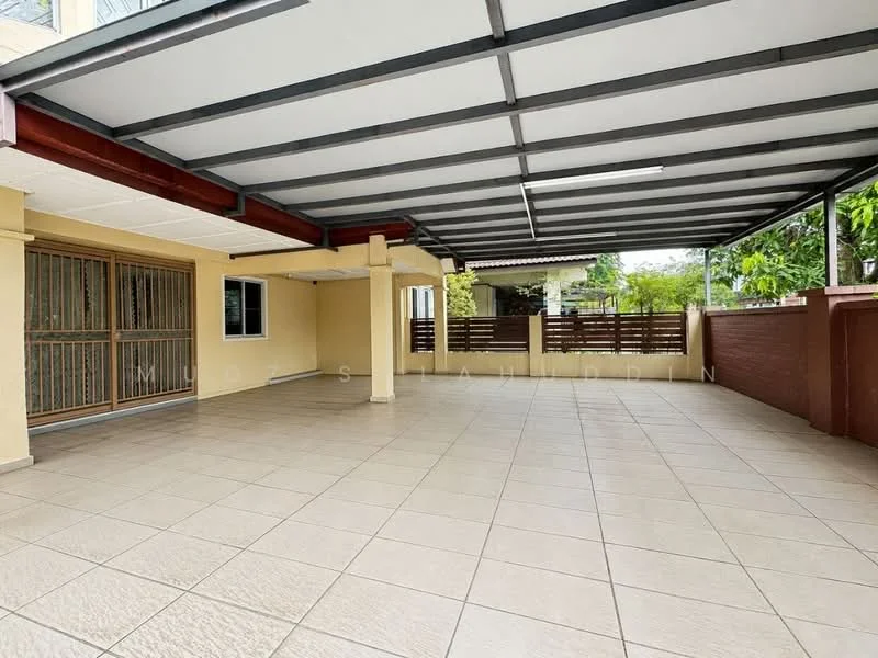 Exterior type: car porch; features: covered car porch with metal roofing, tiled flooring, yellow painted walls, wooden slatted fencing, large windows, open space, surrounded by greenery; style: modern.