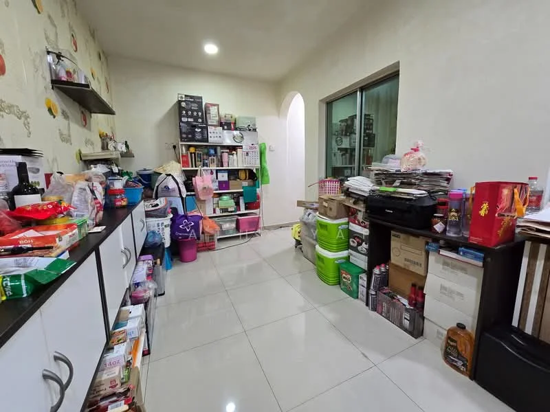 Room features: white painted walls, glossy ceramic tile flooring, recessed downlights, built-in cabinets, open shelving, various storage boxes, stacked boxes, colorful packaging materials, decorative wall with floral pattern.