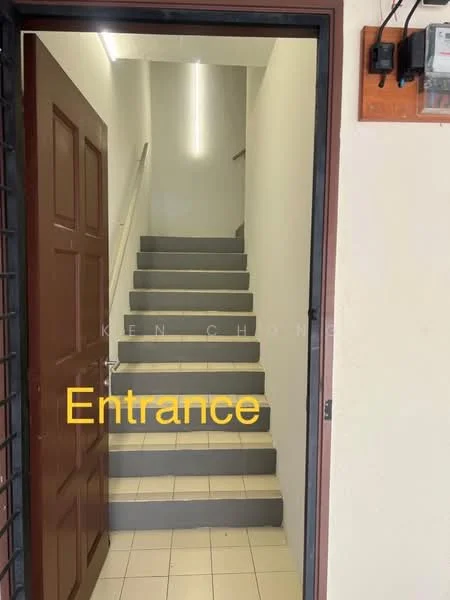 Room features: brown wooden door, white painted walls, grey tiled flooring, staircase with grey steps, handrail on one side, bright overhead lighting, wall-mounted electrical panel; style: modern.