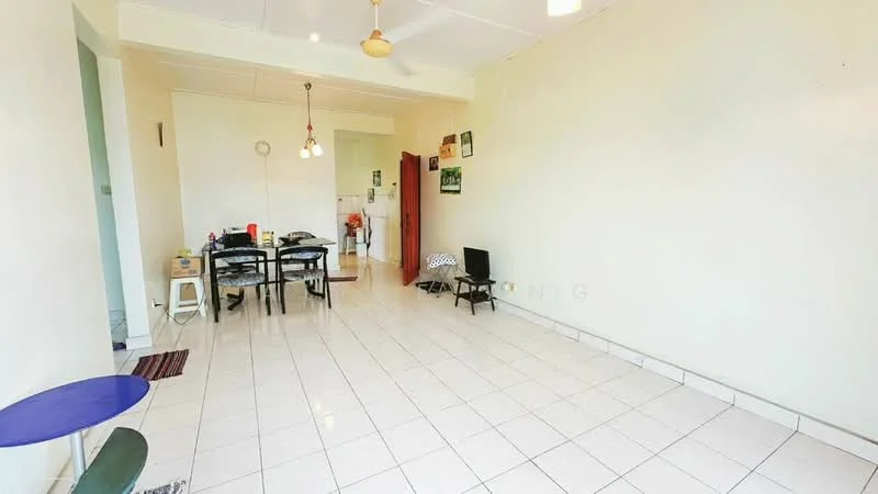 Room features: white painted walls, tile flooring, ceiling fan, dining table with chairs, small side table, open layout, kitchen area visible in background, natural light from windows; style: minimalist.