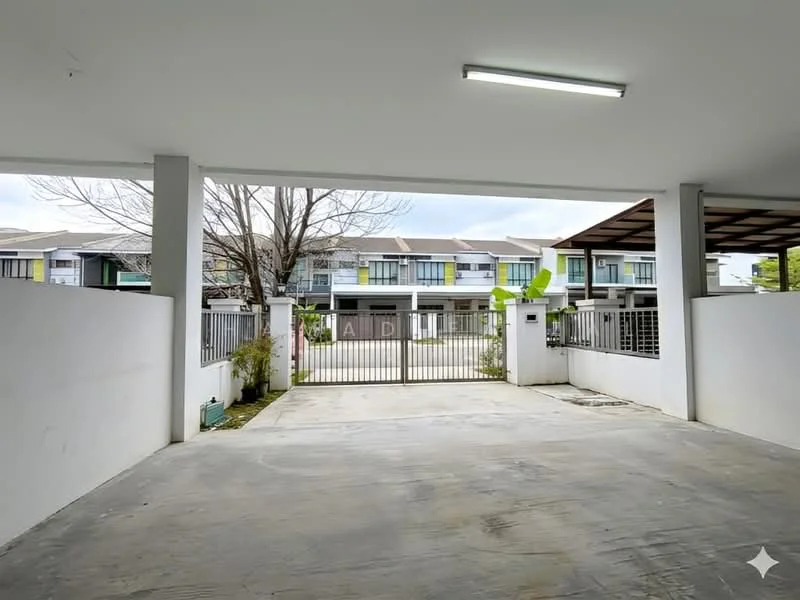 Exterior type: car porch; features: open-air parking lot, concrete flooring, metal gate, surrounded by white walls, landscaped area with small plants, overhead lighting, view of residential buildings in background; style: modern.