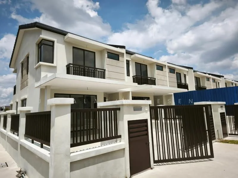 Exterior type: linked terrace house; features: white painted facade, grey accent panels, flat roof, two-storey structure, balconies with black railings, large windows, gated entrance, concrete fence, driveway, manicured landscaping; style: modern.
