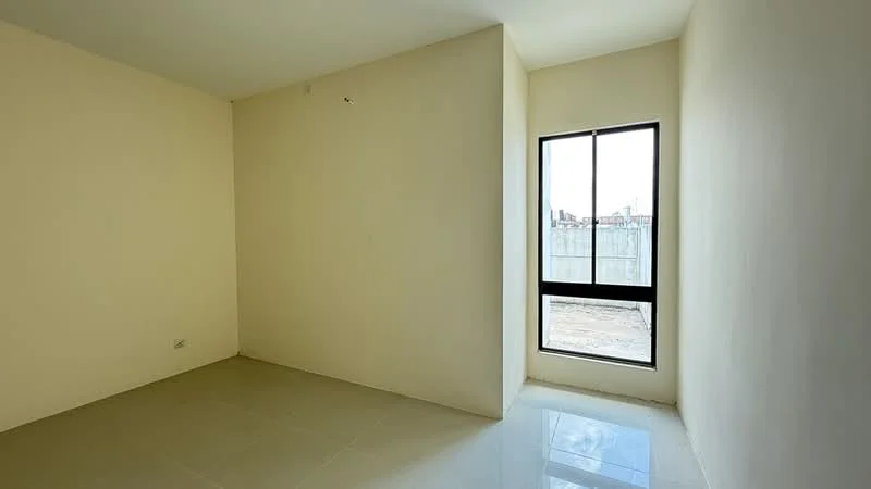 Room features: white painted walls, glossy tile flooring, floor-to-ceiling window, natural light, minimalist design; style: modern; view: courtyard.