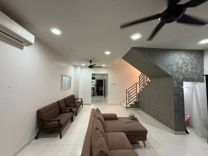 Living features: white painted walls, polished tile flooring, 5-blade ceiling fan, recessed LED downlights, L-shape sectional sofa in brown, 2-seater wooden sofa, mirror on wall, staircase with metal railing, open layout to kitchen, air conditioning unit on wall; style: modern.