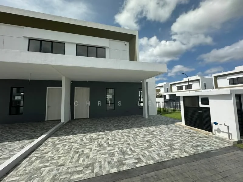 Exterior type: semi-detached house; features: white painted facade, grey accent wall, flat roof, approximately 2-storey, manicured lawn, paved driveway, modern architectural design, large windows, covered porch, fenced perimeter; style: modern.