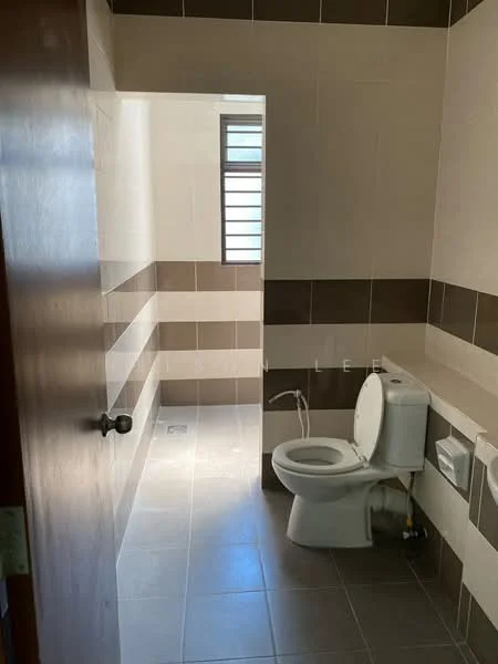 Bathroom features: white toilet, grey floor tiles, beige wall tiles, brown accent tiles, window for natural light, toilet paper holder, wall-mounted faucet, shower area with no visible shower head; style: modern.