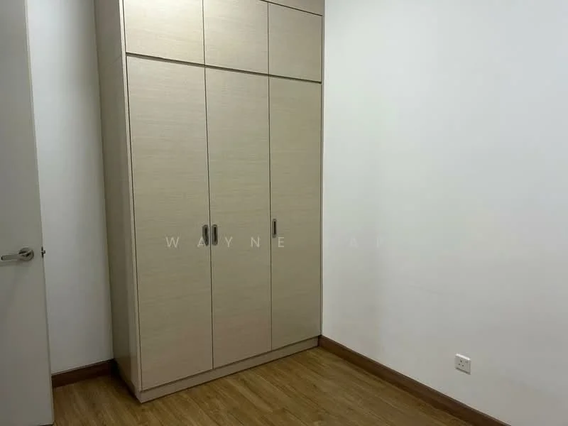 Room features: built-in wardrobe with multiple doors, light wood finish, laminate flooring, white painted walls, baseboard trim, single light switch, neutral color scheme; style: modern.