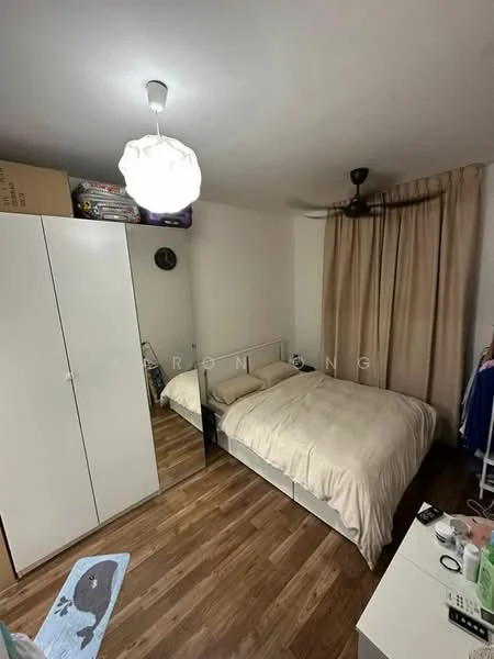 Bedroom features: queen-size bed with beige bedding, white bed frame, wooden flooring, white painted walls, ceiling fan, hanging light fixture, curtains, built-in wardrobe with mirror, nightstand with lamp, decorative wall clock; style: modern.