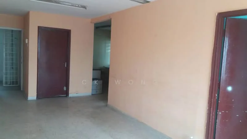 Room features: cream painted walls, concrete flooring, single wooden door, double wooden door, fluorescent ceiling lights, window with natural light, open layout.