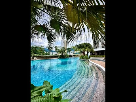 Exterior type: swimming pool deck; features: infinity pool, landscaped garden, tropical palm trees, stone-paved walkway, manicured lawn, city skyline in background; style: modern.