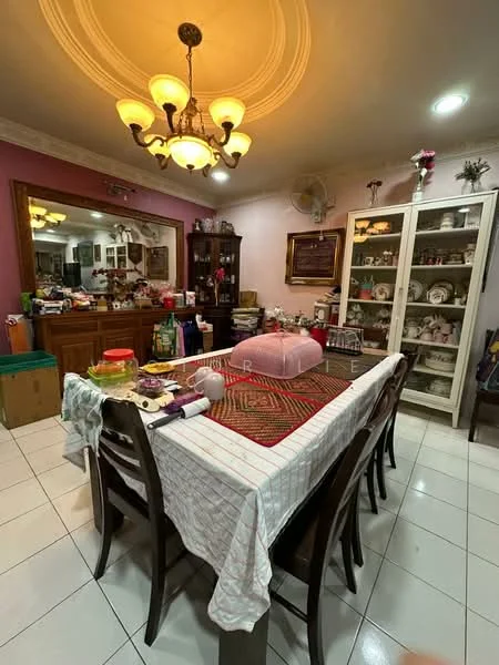 Dining features: rectangular dining table with white tablecloth, 8 wooden dining chairs, chandelier with multiple bulbs, pink decorative table runner, wooden sideboard with decorative items, glass-front cabinet with dishes, cream tiled flooring, purple painted accent wall, wall-mounted fan, framed artwork on the wall, decorative items on the table; style: traditional.