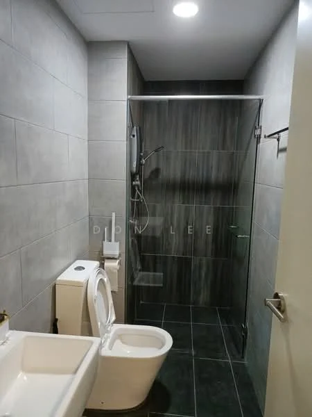 Bathroom features: grey tiled walls, dark grey floor tiles, walk-in shower with glass enclosure, rain shower head, handheld shower, single-sink vanity with white cabinet, one-piece toilet, chrome basin mixer, recessed ceiling lights; style: modern.