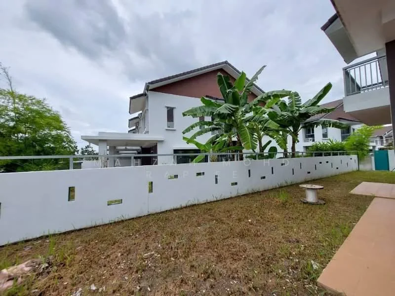 Exterior type: detached bungalow; features: white painted facade, flat roof, manicured lawn, banana trees, concrete boundary wall with cutouts, paved walkway, surrounded by greenery; style: modern.