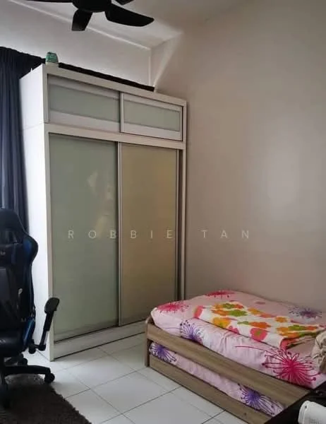 Bedroom features: single bed with floral bedding, built-in wardrobe with sliding doors, white painted walls, ceiling fan, tile flooring, black office chair, curtains, decorative items on top of wardrobe.
