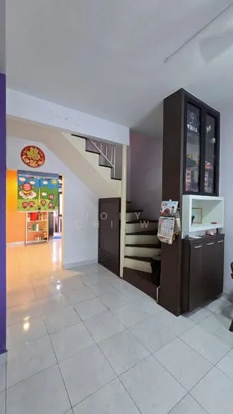 Room features: white painted walls, grey tiled flooring, staircase with wooden steps, built-in cabinet with glass doors, open layout, decorative wall art, doorway leading to another room, light fixture on ceiling; style: modern.