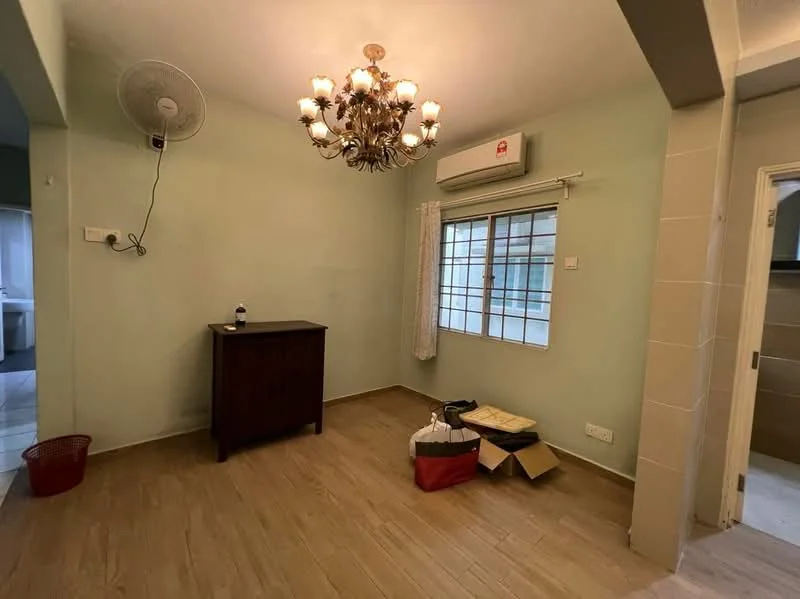 Living features: wooden flooring, green painted walls, chandelier light fixture, 1 wall-mounted split AC, floor-to-ceiling window, sheer curtains, wooden sideboard, decorative items in boxes, ceiling fan.