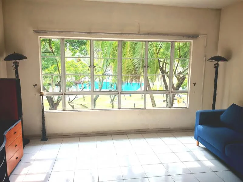 Living features: blue fabric sofa, large windows with multiple panes, white tiled flooring, lamps on either side of the sofa, neutral painted walls, view of greenery and pool outside; style: modern; view: garden.