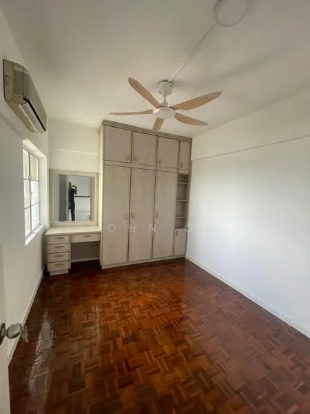 Bedroom features: parquet wood flooring, white painted walls, 5-blade ceiling fan, wall-mounted split AC, built-in wardrobe with sliding doors, dressing table with mirror, window with natural light, neutral color scheme; style: modern.