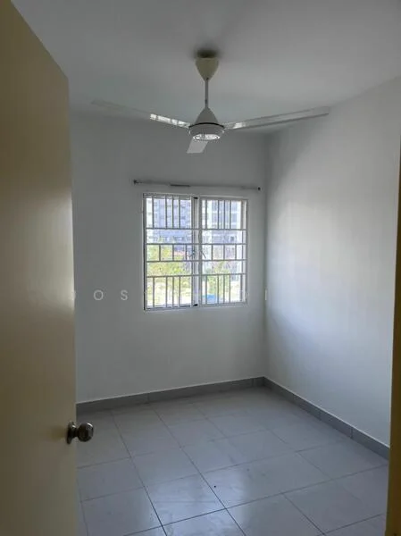 Room features: white painted walls, grey tiled flooring, ceiling fan, window with multiple panes, natural light from window, door with round knob.