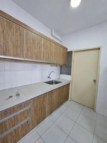 Kitchen features: laminate cabinetry with wood finish, white tiled backsplash, light grey countertop, single-bowl stainless-steel sink, chrome pull-down faucet, built-in wall cabinet, floor tiles in light grey, door leading to another room; style: modern.