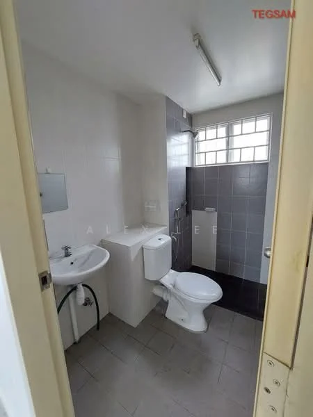 Bathroom features: white ceramic toilet, single-sink vanity with chrome faucet, framed mirror, grey tiled walls, white tiled walls, grey tile flooring, window for natural light, shower area with glass partition; style: modern.
