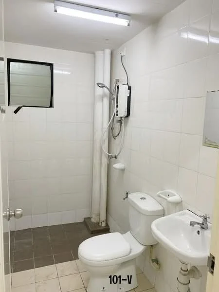 Bathroom features: white tiled walls, grey tiled flooring, one-piece toilet, wall-mounted basin, chrome basin mixer faucet, shower with wall-mounted shower head, water heater unit, mirror above basin, window for natural light, light fixture on ceiling; style: modern.