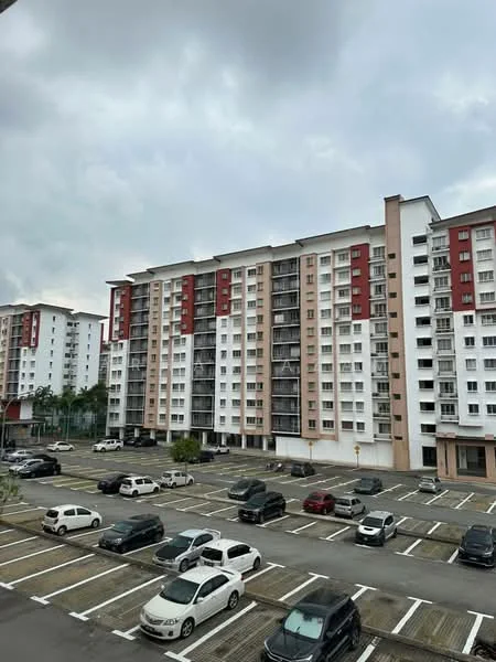 Exterior type: mid-rise condominium; features: white painted facade, red accent panels, balconies with railings, parking lot with marked spaces, surrounding greenery, multiple storeys, concrete structure; style: modern.