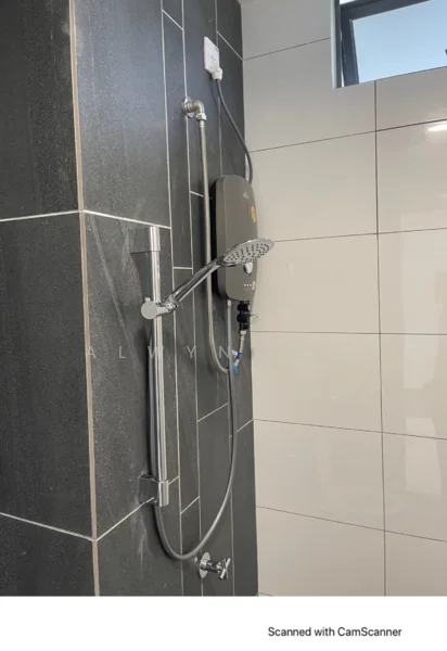 Bathroom features: grey ceramic wall tiles, white ceramic floor tiles, shower head with handheld attachment, wall-mounted shower mixer, water heater unit, chrome shower rail, glass shower enclosure, recessed lighting; style: modern.