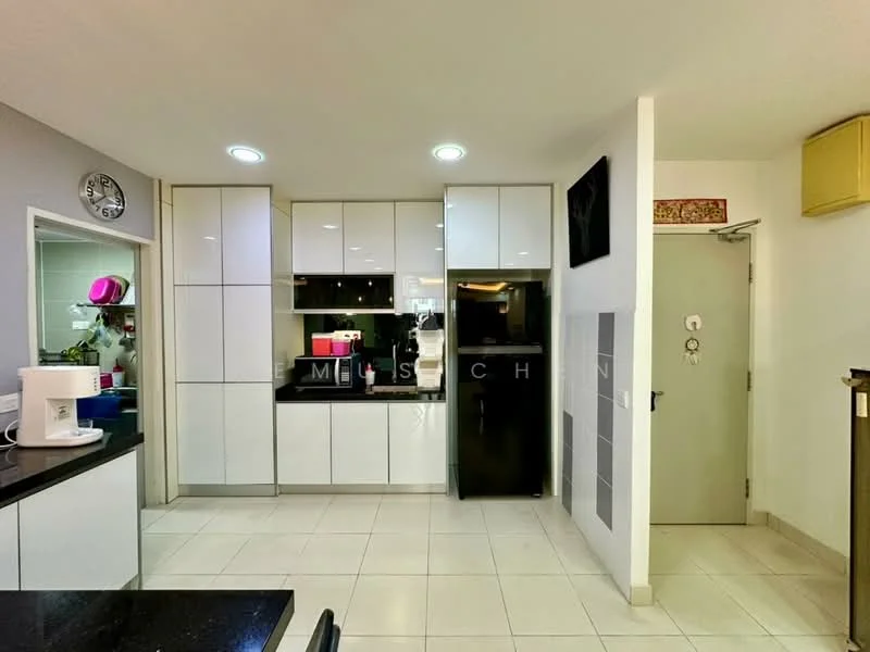 Kitchen features: white flat-panel cabinets, black countertop, stainless-steel fridge, built-in oven, ceramic tile flooring, recessed downlights, wall-mounted clock, black glass splashback, kitchen island, door to utility area; style: modern.