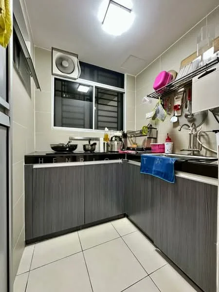 Kitchen features: grey laminate cabinetry, black countertop, stainless-steel sink, chrome pull-down faucet, built-in wall-mounted air conditioning unit, ceramic tile flooring, wall-mounted shelves, window with metal grille, cooking pots and utensils, dish drying rack, kitchen towels, plastic containers, cutting board; style: modern.