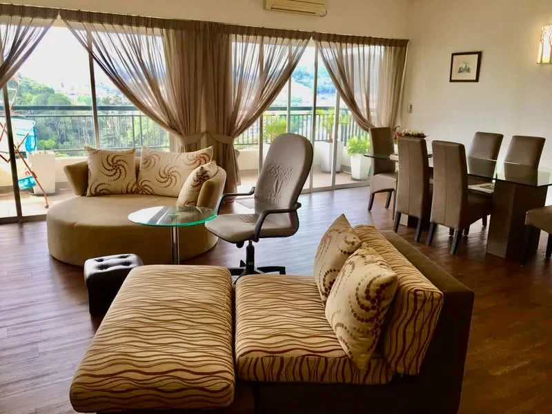 Living features: L-shape sectional sofa with patterned upholstery, glass coffee table, armchair with wheels, dining table with six chairs, floor-to-ceiling windows, sheer curtains, wooden flooring, decorative wall art, potted plants, balcony access, air conditioning unit; style: modern; view: garden.