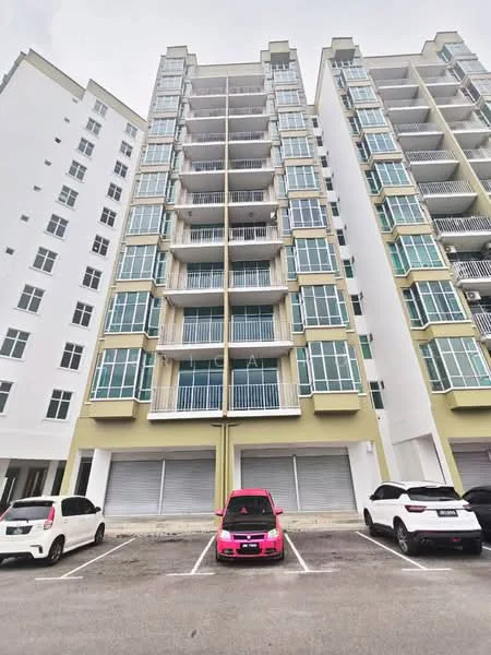 Exterior type: mid-rise condominium; features: white painted facade, green accent panels, glass windows, recessed balconies, parking lot with marked spaces, two visible cars in parking lot, multiple storeys, balconies with railings; style: modern.