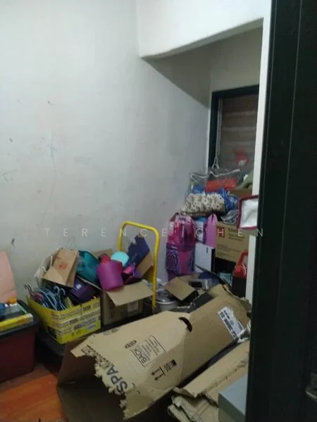 Room features: cluttered space, cardboard boxes, plastic containers, various household items, wooden flooring, painted walls, window with blinds.