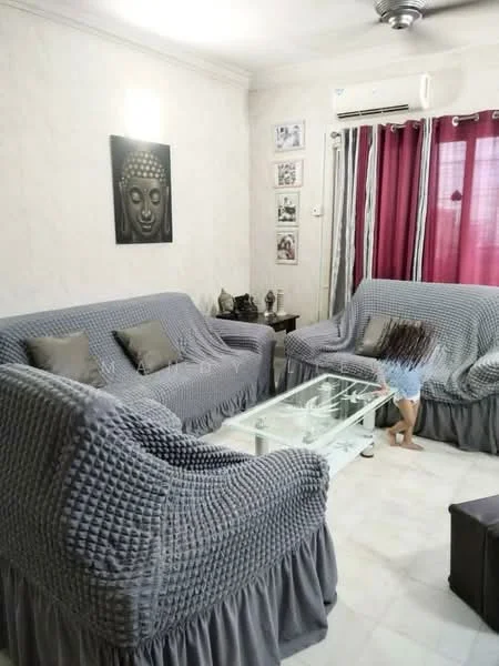 Living features: grey fabric 3-seater sofa, grey fabric 2-seater sofa, glass coffee table, white tiled flooring, white painted walls, ceiling fan, red curtains, wall-mounted air conditioning unit, framed artwork on wall, decorative statue, decorative items on side table; style: contemporary.