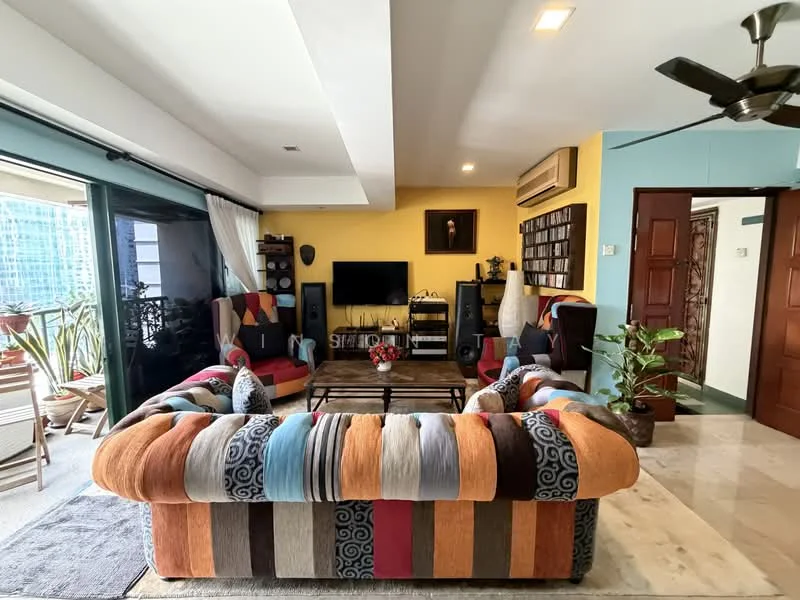 Living features: 3-seater fabric sofa with colorful upholstery, 2 armchairs with patterned fabric, coffee table with dark wood finish, wall-mounted TV, entertainment unit with shelves, decorative wall art, ceiling fan with light, marble flooring, floor-to-ceiling windows, sliding glass door, indoor plants, area rug with geometric pattern; style: contemporary; view: city. Balcony features: outdoor seating area, potted plants, glass railing; view: city.