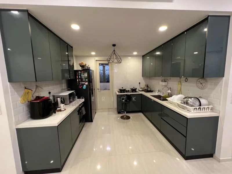 Kitchen features: dark green cabinetry, white quartz countertop, stainless-steel sink, chrome pull-down faucet, built-in oven, freestanding fridge, black microwave, ceramic tile backsplash, pendant light fixture, recessed LED downlights, open shelving, white tiled flooring, kitchen island with seating; style: modern.