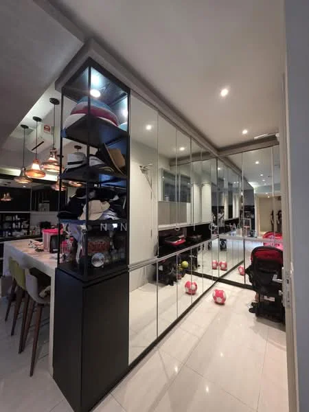 Room features: mirrored cabinetry, black shelving unit, white tiled flooring, recessed downlights, pendant lighting, open shelving with decorative items, stroller, children's toys, dining table, black cabinetry, kitchen area visible in background; style: modern.