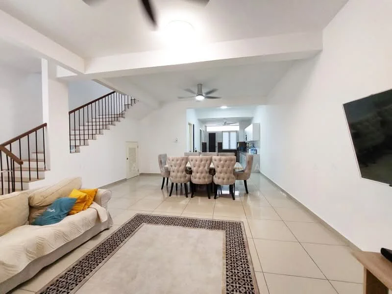 Living features: cream painted walls, white ceiling, 5-blade ceiling fan with light, wall-mounted TV, sofa in beige, decorative cushions in blue and yellow, area rug with geometric pattern, dining table with 8 upholstered chairs, tile flooring, staircase with wooden railing; style: modern. Kitchen features: open kitchen layout, white cabinetry, countertop with bar seating, stainless-steel appliances, tile backsplash, kitchen island, recessed lighting; style: modern.
