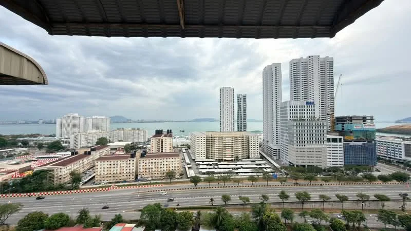 Exterior type: high-rise condominium; features: city skyline view, sea view, multiple high-rise buildings, highway visible, surrounded by greenery, urban landscape; style: modern.
