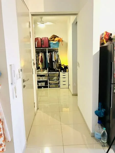Hallway features: white painted walls, glossy tile flooring, ceiling fan, built-in wardrobe with clothes, storage drawers, luggage bags, shoe storage, door leading to another room; style: modern.