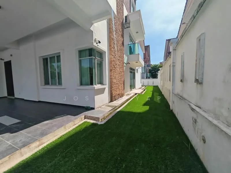 Exterior type: detached bungalow; features: manicured lawn, stone-paved walkway, exposed brick facade, glass balcony, white painted facade, two-storey building, surrounded by greenery; style: modern.