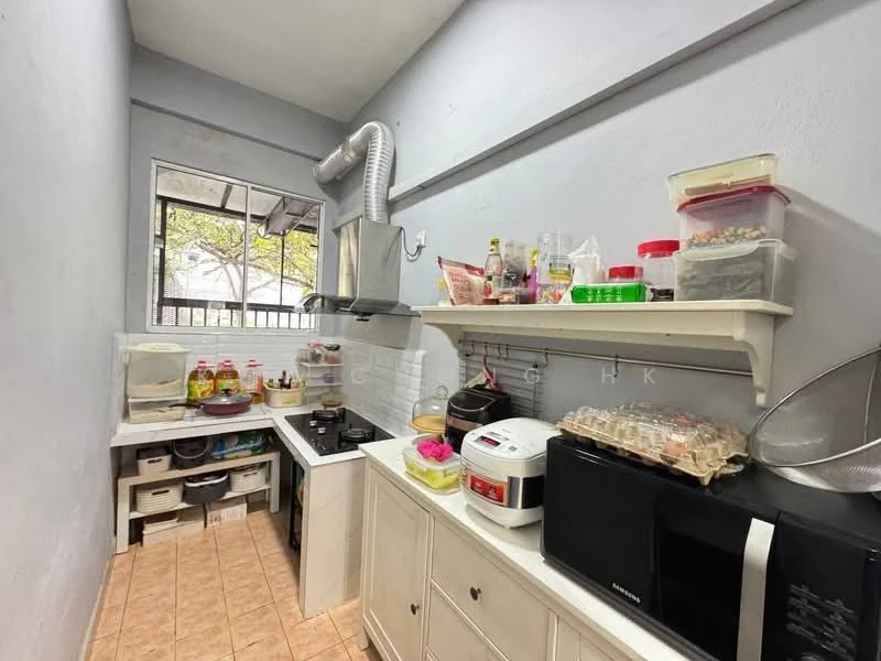 Kitchen features: white cabinetry, grey walls, tile flooring, stainless-steel sink, gas stove with two burners, microwave, rice cooker, countertop with open shelving, refrigerator, window for natural light, exhaust hood, storage boxes under counter; view: garden.