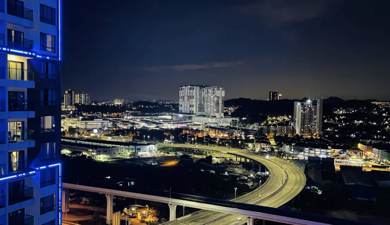 Exterior type: high-rise condominium; features: city skyline view, night lighting, surrounding urban landscape, highway visible, multiple high-rise buildings, illuminated structures; style: modern.