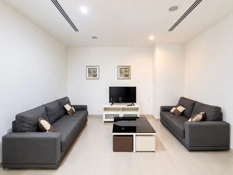 Living features: 2 grey fabric 3-seater sofas, black coffee table with white and brown accents, wall-mounted TV, 2 framed artworks on the wall, recessed ceiling lights, light-colored tile flooring, white painted walls, air conditioning vents on ceiling; style: modern.